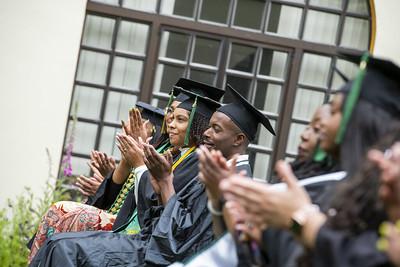 Students applause during Black grad celebration 