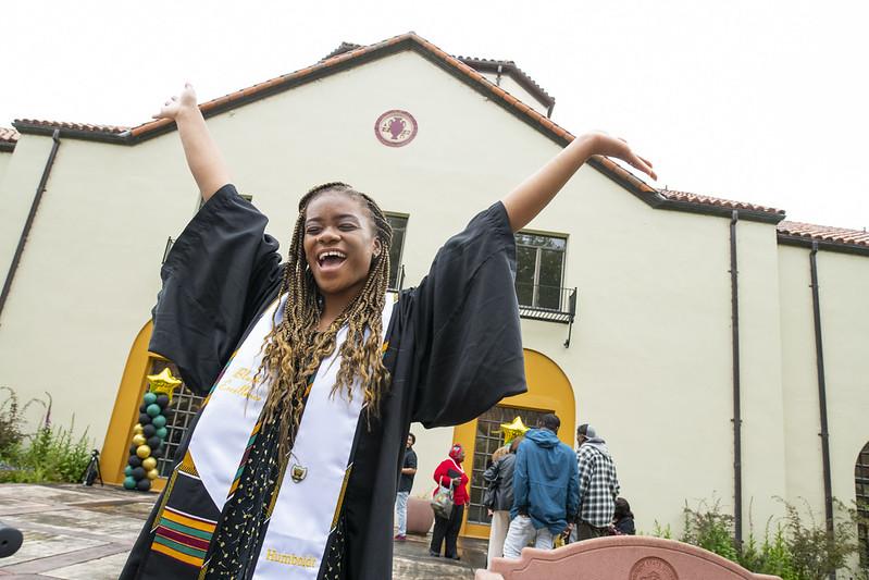 Student celebrating at Black grad